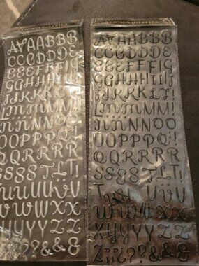 Stick a bilities alphabet stickers. Silver and black